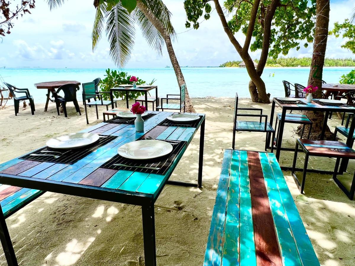 Beach House Dhiffushi Bagian luar foto